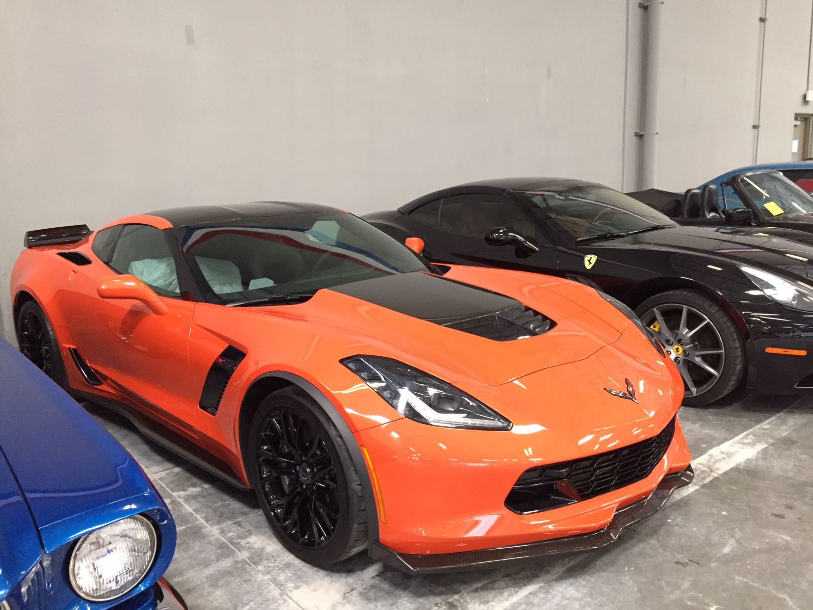 Orange Corvette Z06 and Ferrari stored indoors in Las Vegas
