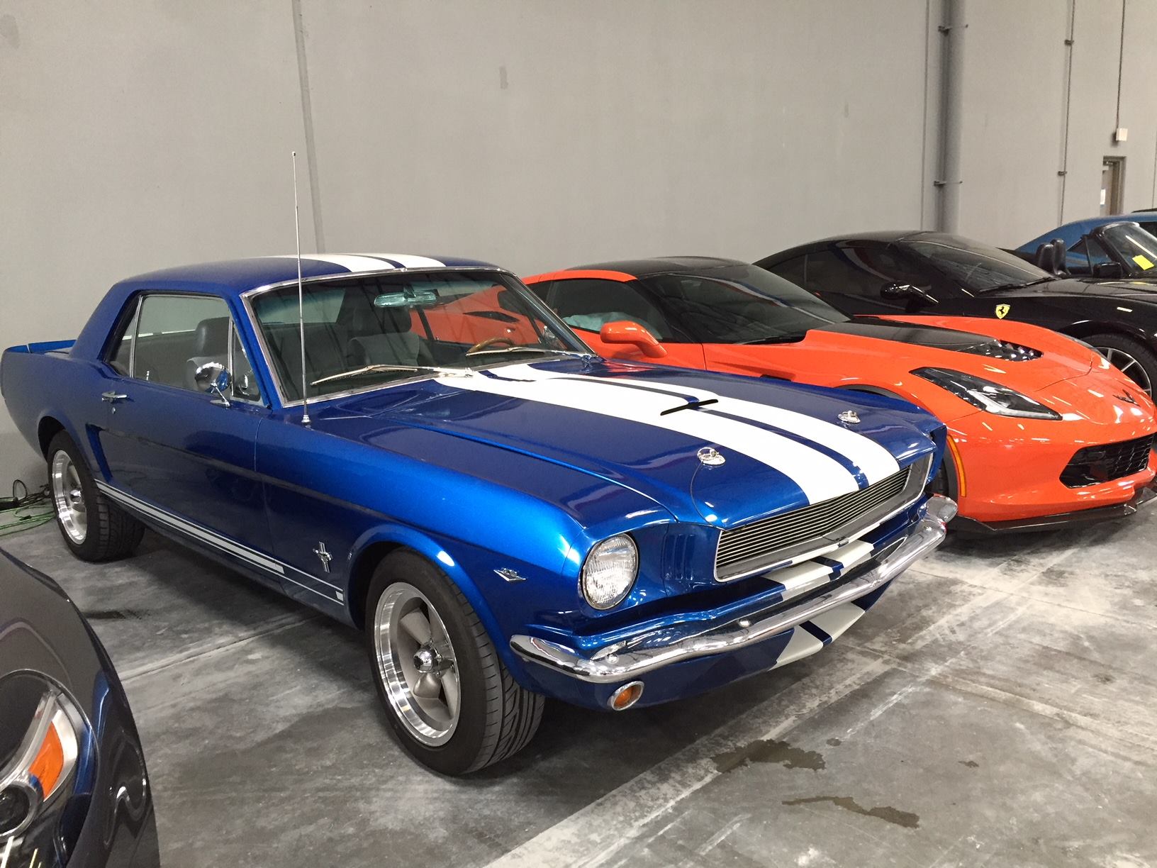 Classic Shelby Mustang and Ferrari inside 24/7 Auto Vault Las Vegas